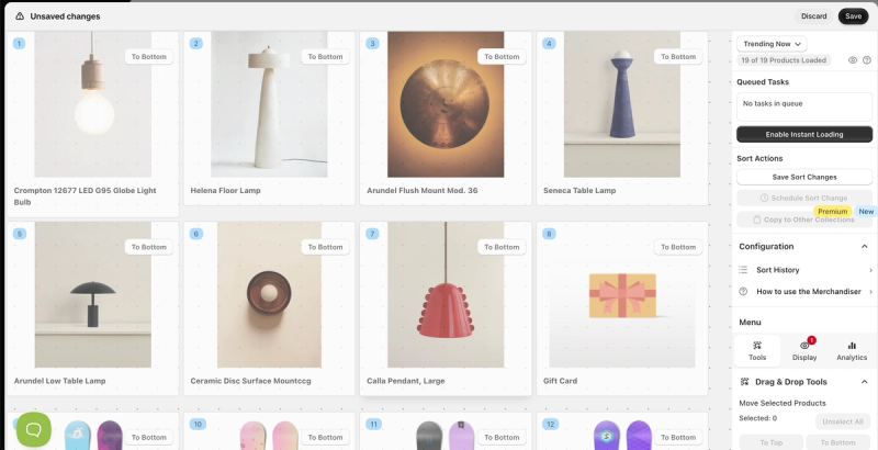Sort'd drag and drop merchandiser with a collection laid out as a product grid, To Bottom buttons, and a sidebar for saving, scheduling and copying sort changes