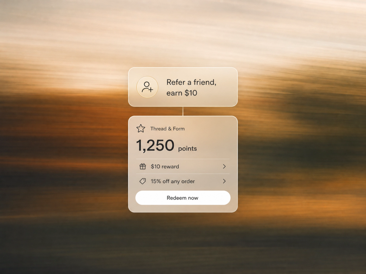 Minimalist landscape with "Loyalty Strategy for Shopify Eyewear and Sunglass Brands" text overlaid in sky, illustrating guide