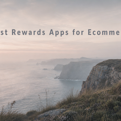 Minimalist landscape with article title "The Best Rewards Apps for Ecommerce Brands in 2026" displayed as text in the sky, re