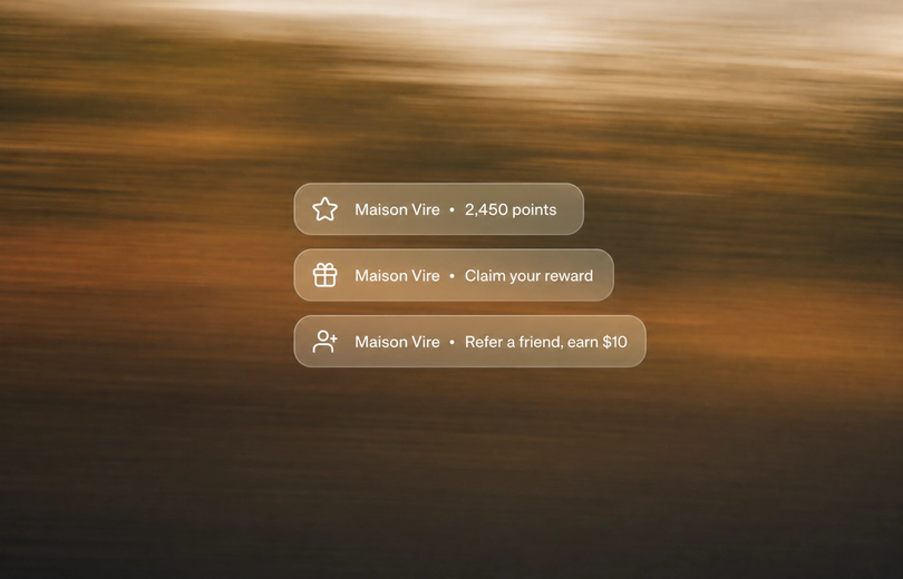Minimalist landscape with "How to Use Shopify Flow to Automate Loyalty Rewards and Triggers" text overlaid in the sky, repres