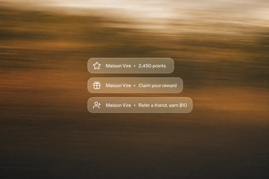Minimalist landscape with "How to Use Shopify Flow to Automate Loyalty Rewards and Triggers" text overlaid in the sky, repres