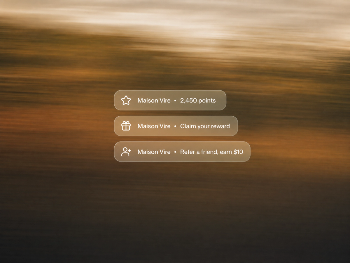 Minimalist landscape with "How to Use Shopify Flow to Automate Loyalty Rewards and Triggers" text overlaid in the sky, repres