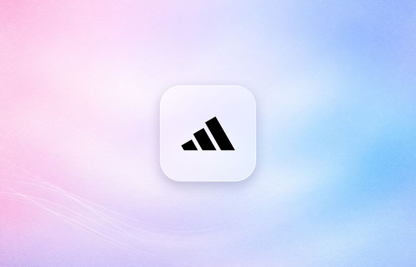 adidas logo on a frosted glass tile over a soft lavender gradient