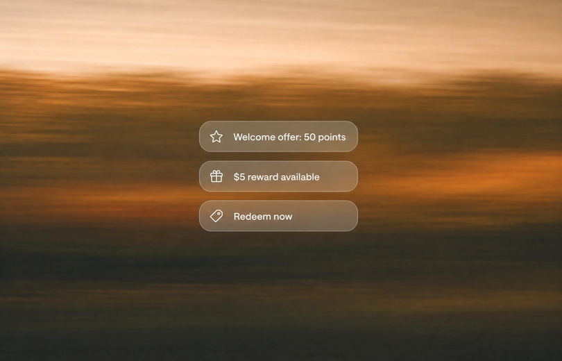 Minimalist landscape with article title "The Real Math Behind Loyalty Program ROI for Shopify Brands" displayed in the sky as