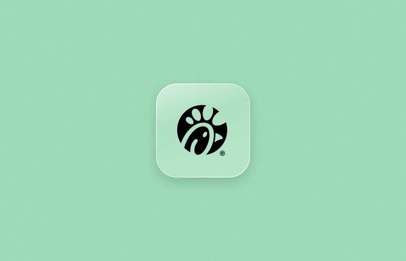 Chick-fil-A logo on a frosted glass tile over a mint green background