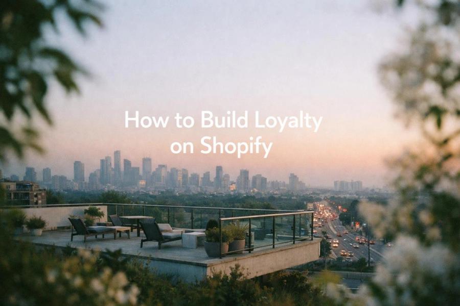Minimalist landscape with "How to Build a B2B Loyalty Program on Shopify" text overlaid in sky, representing a guide to imple