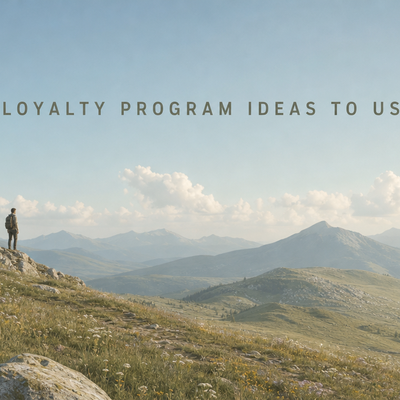 Minimalist landscape with "25 Loyalty Program Ideas to Steal in 2026" text overlaid in sky, illustrating article about custom