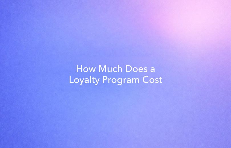 White text reading “How Much Does a Loyalty Program Cost” on a soft gradient background.