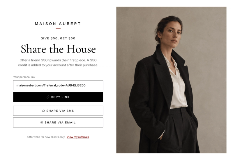 Fashion brand referral page offering Give $50, Get $50, with a personal referral link and Copy Link, SMS, and email buttons