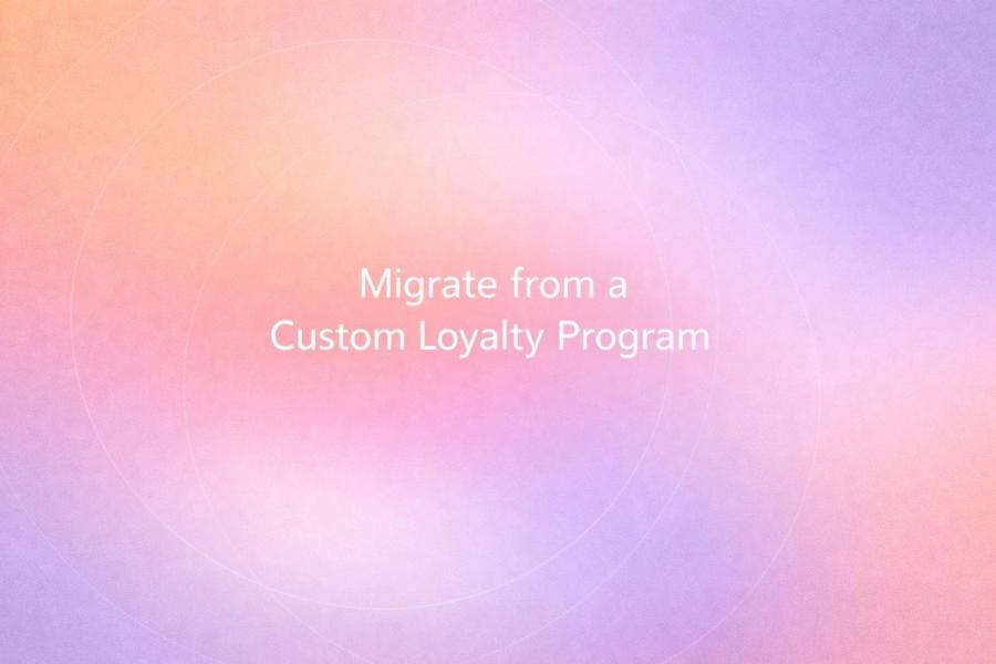 White text reading “Migrate from a Custom Loyalty Program” over a soft gradient background.