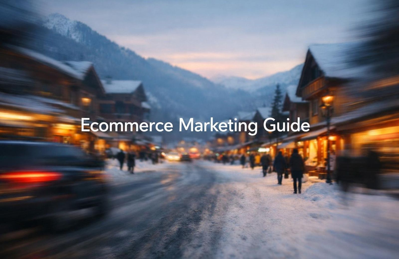 White text reading "Ecommerce Marketing Guide" over a snowy alpine village street at dusk with lit shopfronts