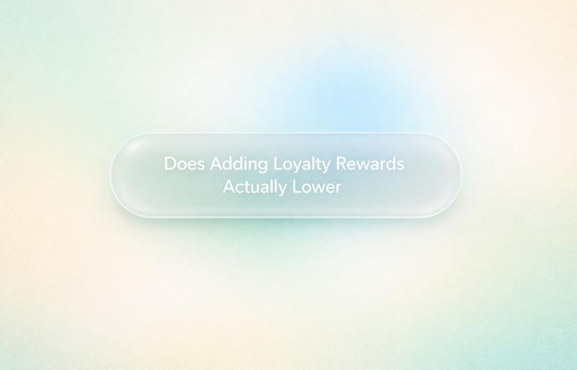 White text reading “Does Adding Loyalty Rewards Actually Lower” over a soft gradient background.
