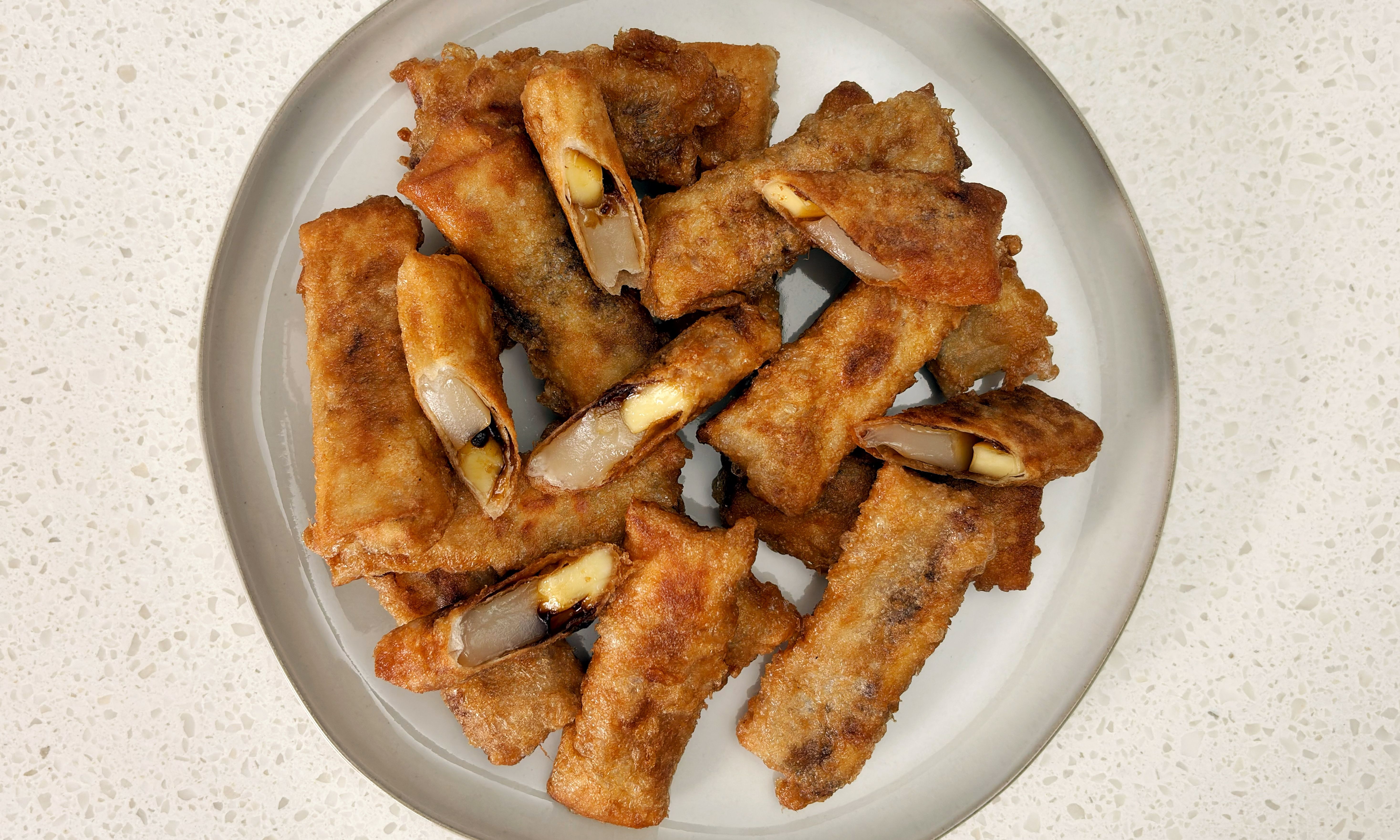 Cheesy Tikoy Lumpia with Muscovado | Pepper.ph - Easy and Practical Filipino Recipes