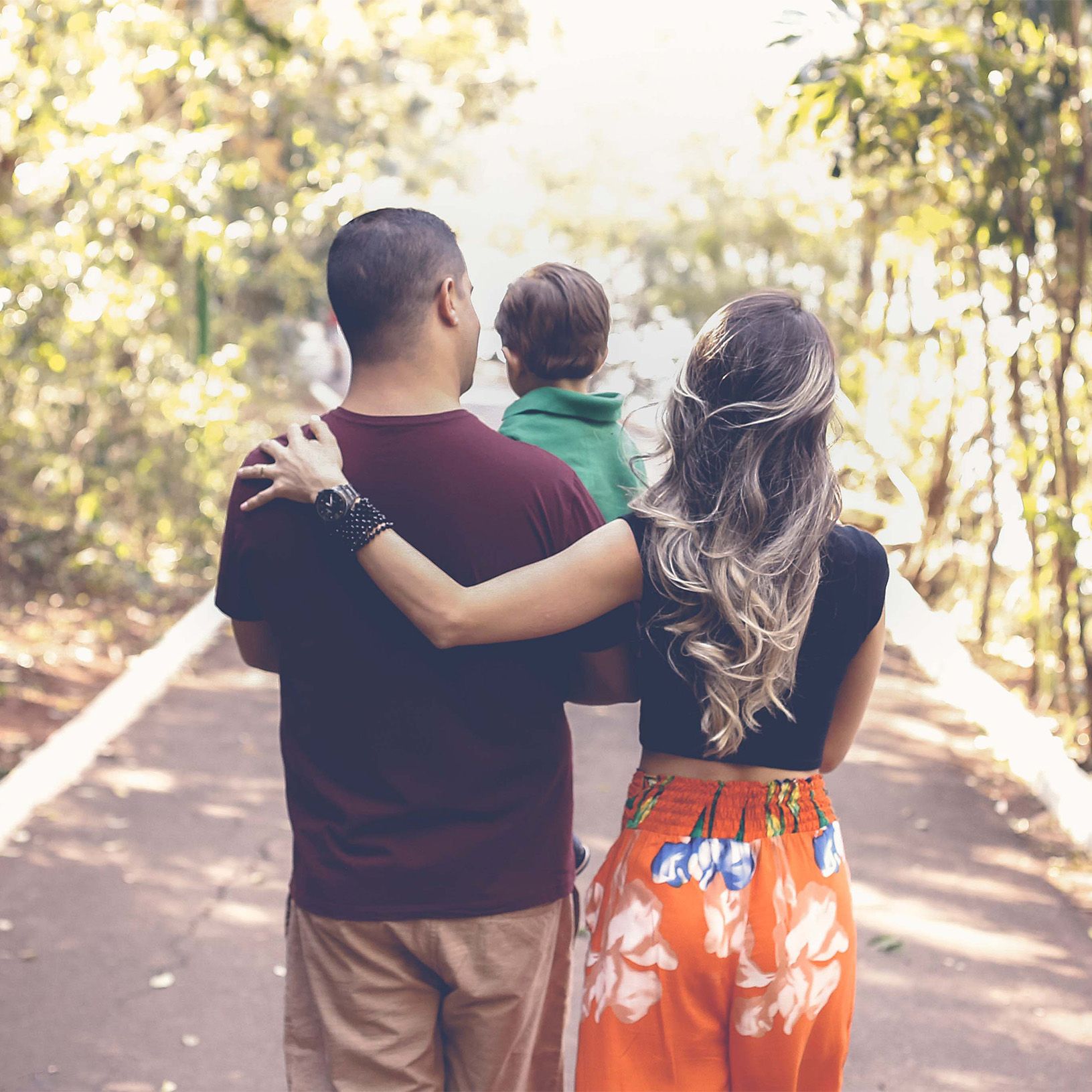 Happy family going for a walk outside.