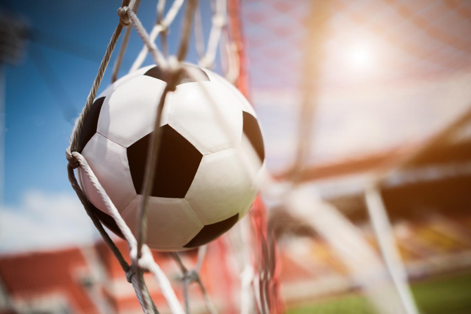 638735375e94cbc586bc5aa9 soccer into goal success concept