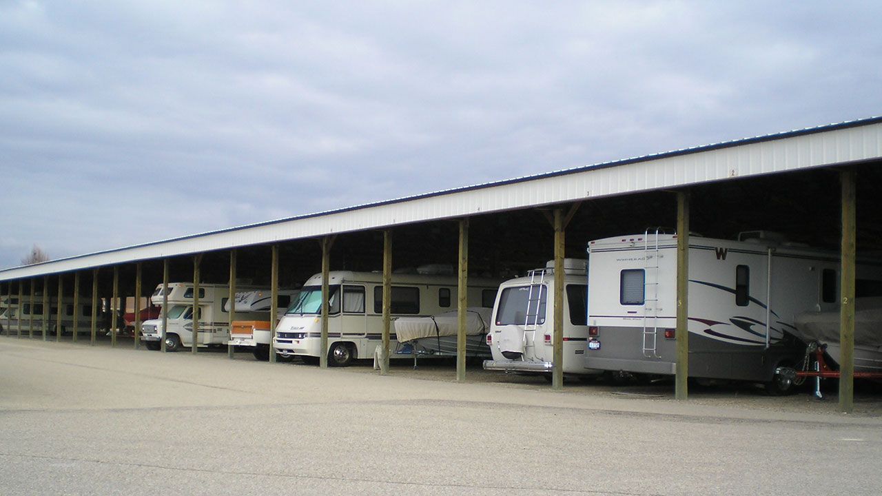 A photo of RVs and boats in storage | Idaho Storage Connection