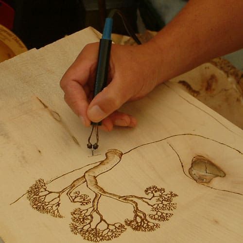 Hand drawing with hot iron