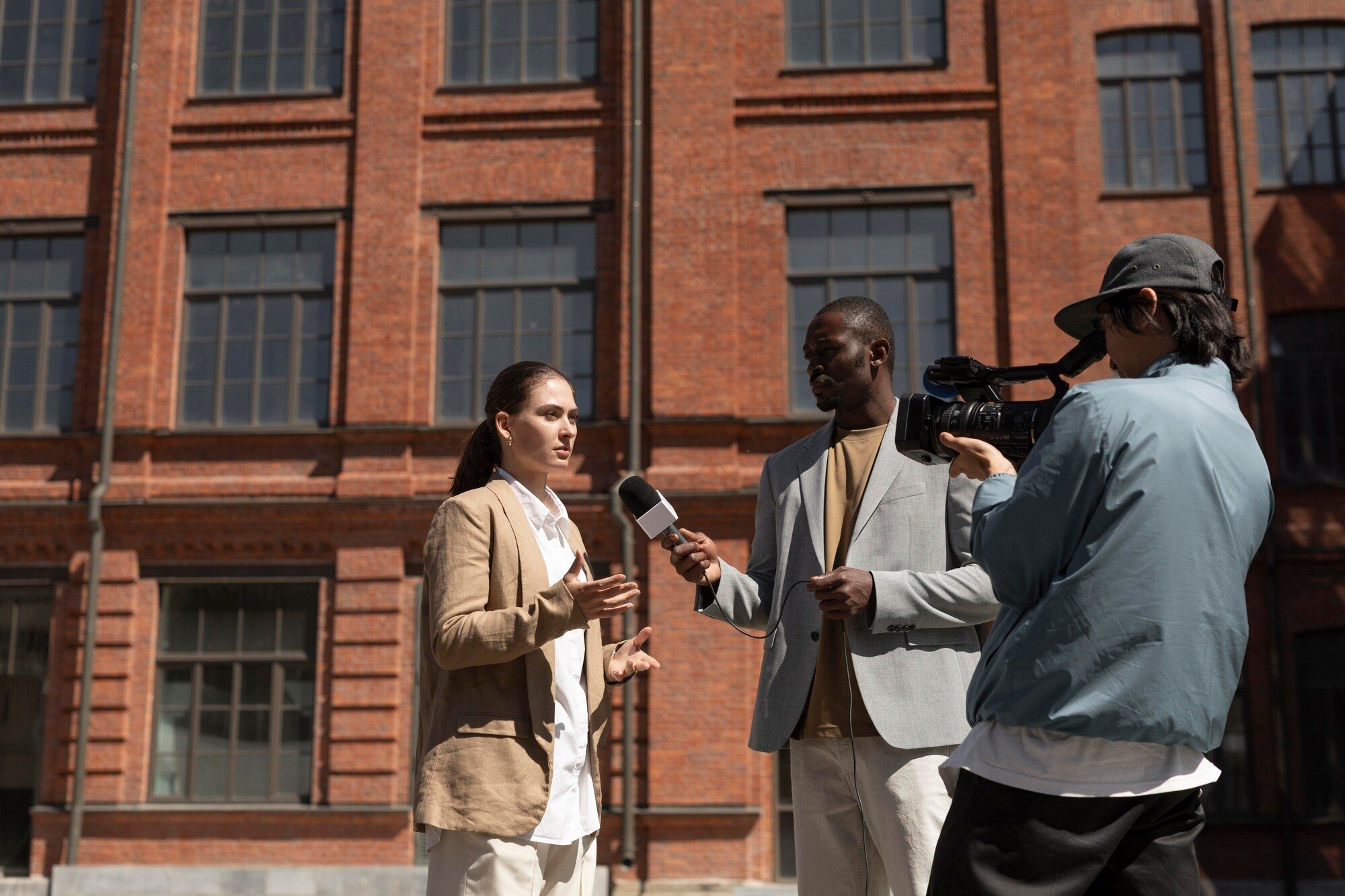 Group of people conducting an interview outdoors