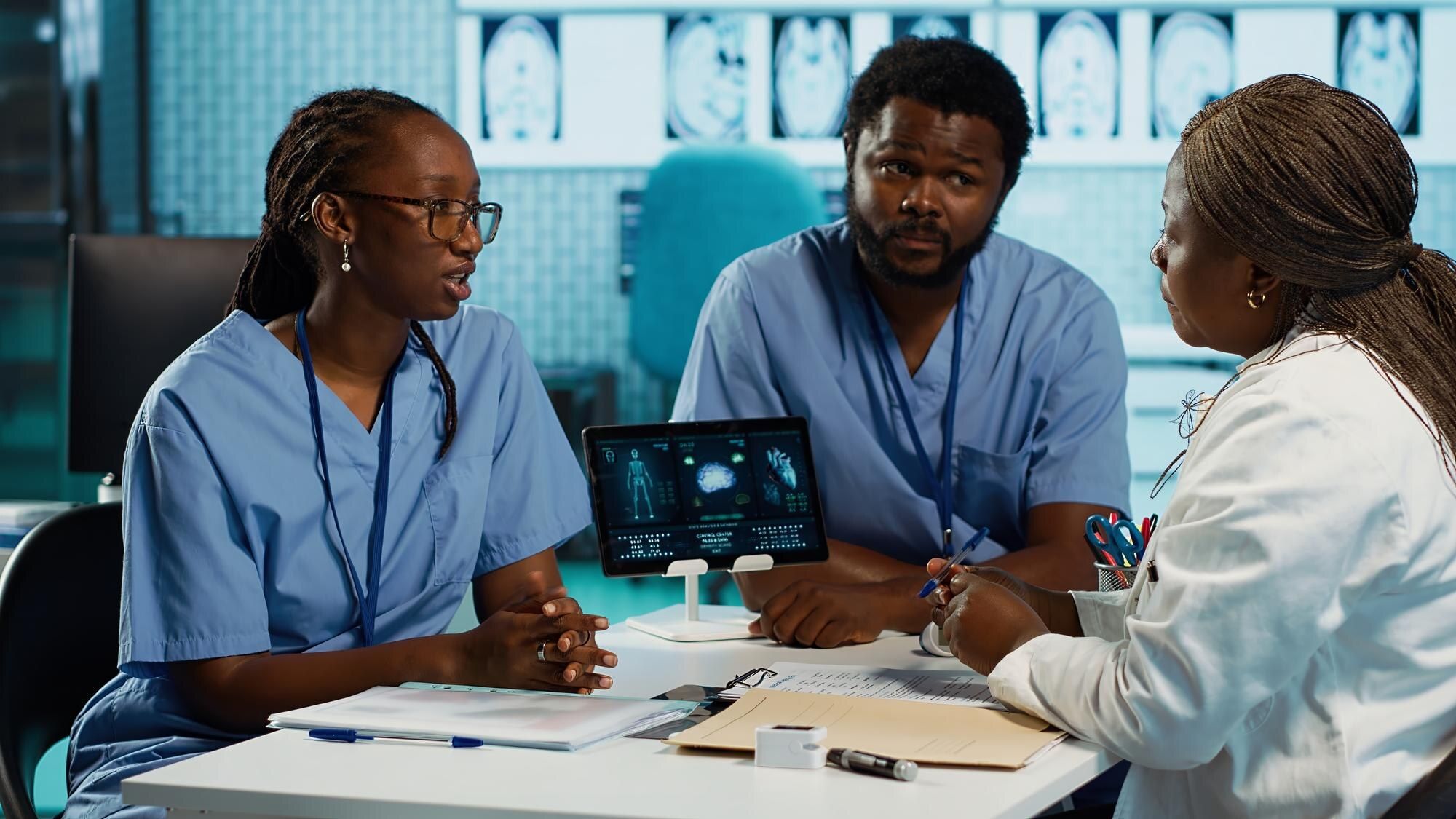 African clinicians in a leadership discussion at a hospital