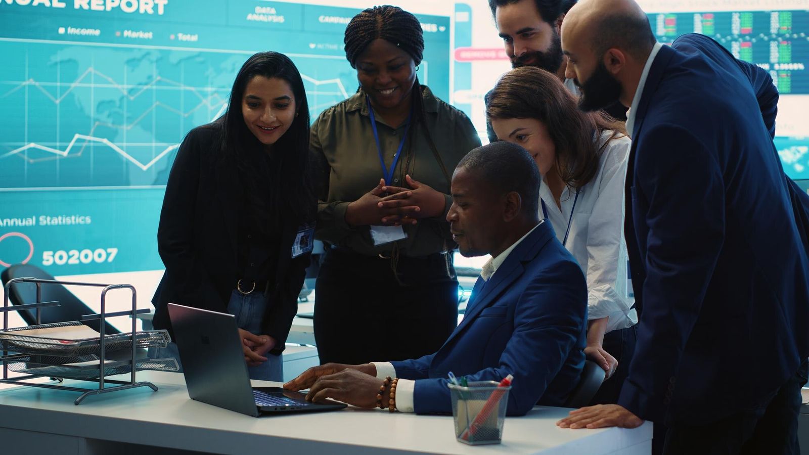 Diverse group of business colleagues celebrating a successful outcome together