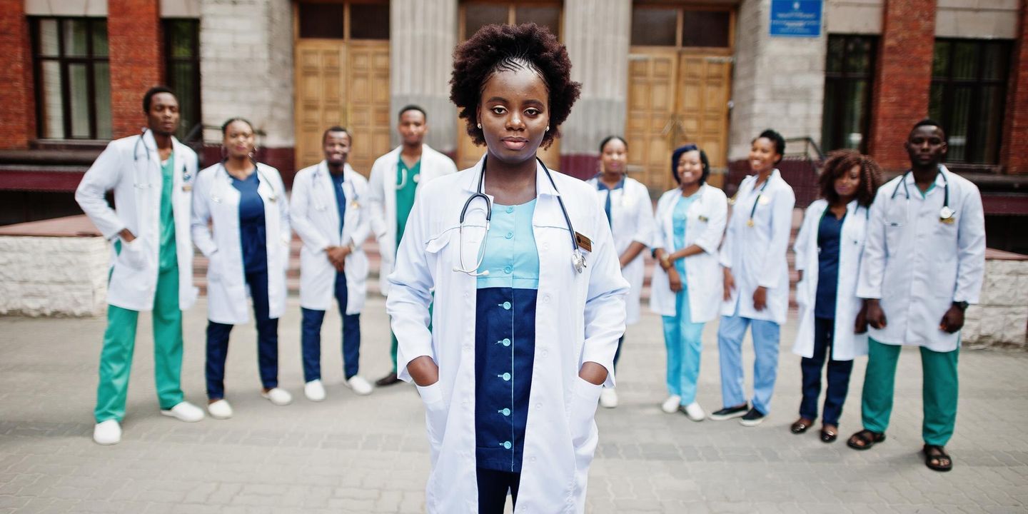 Group of African medical professionals together outdoors