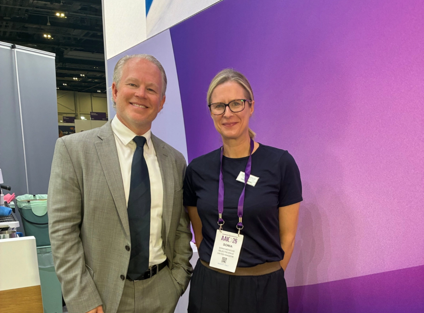 Sonia Nicholas with Dr. Chris Bird, Beckman Coulter Diagnostics at AAIC 2026