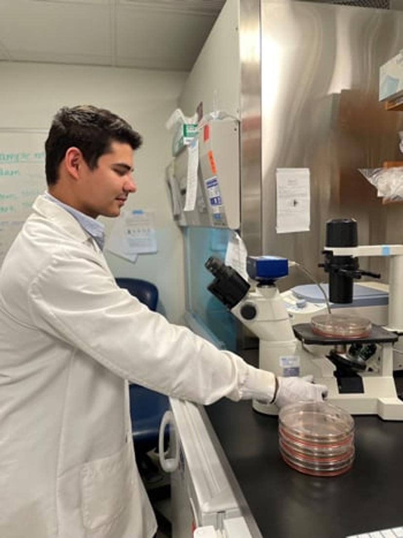 Adam Acker working in a lab