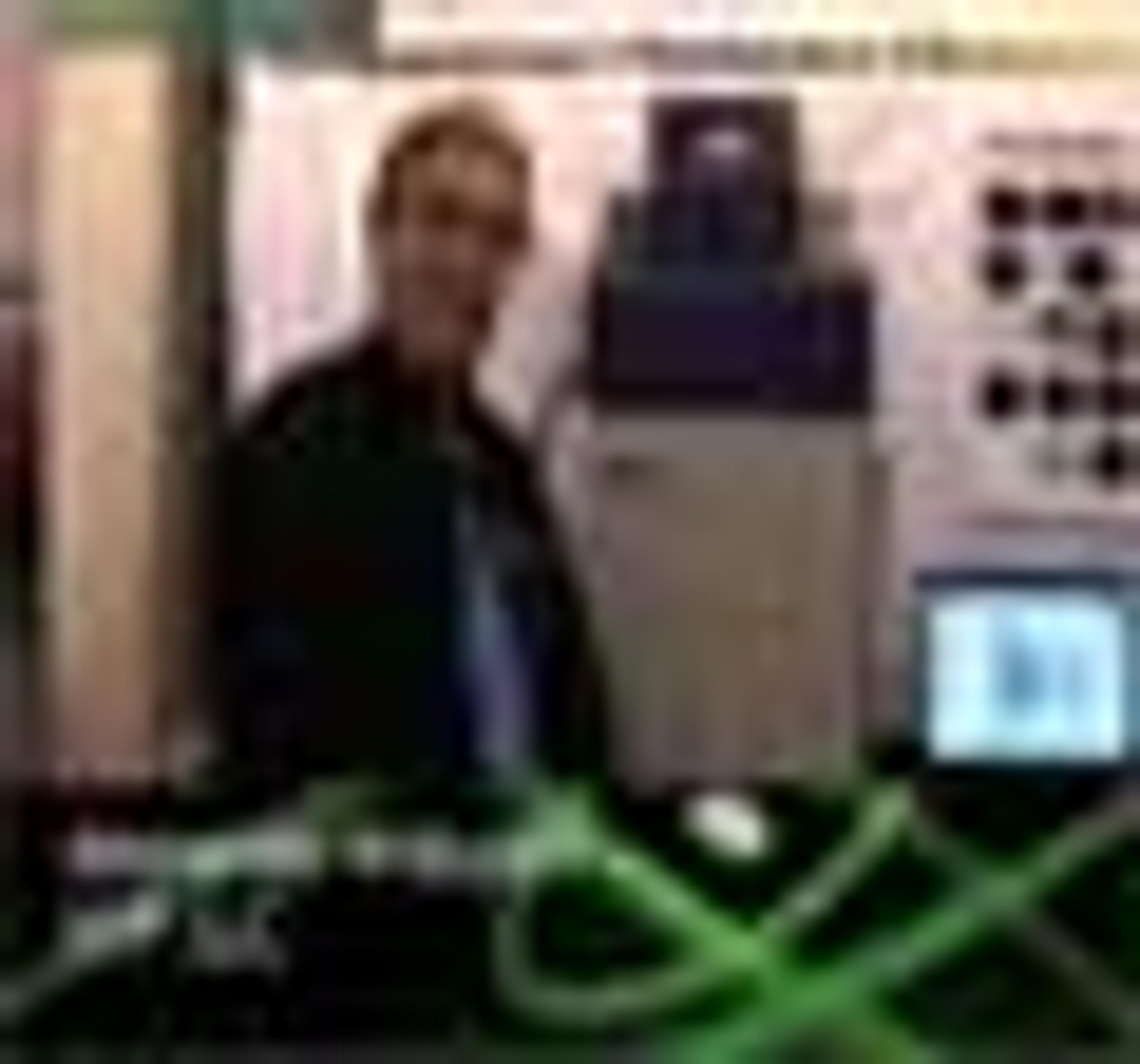Automated Bioimaging System for Multiple Applications Automated Bioimaging System for Multiple Applications
