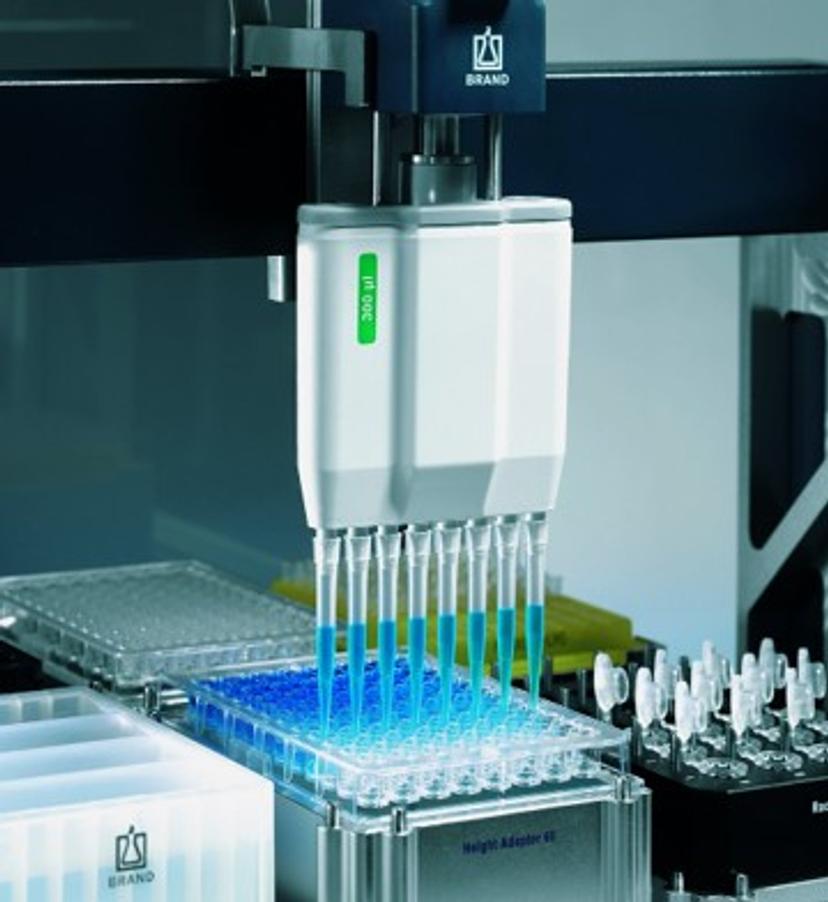 Exchangeable liquid ends and a 96-well plate inside the BRAND Liquid Handling Station.