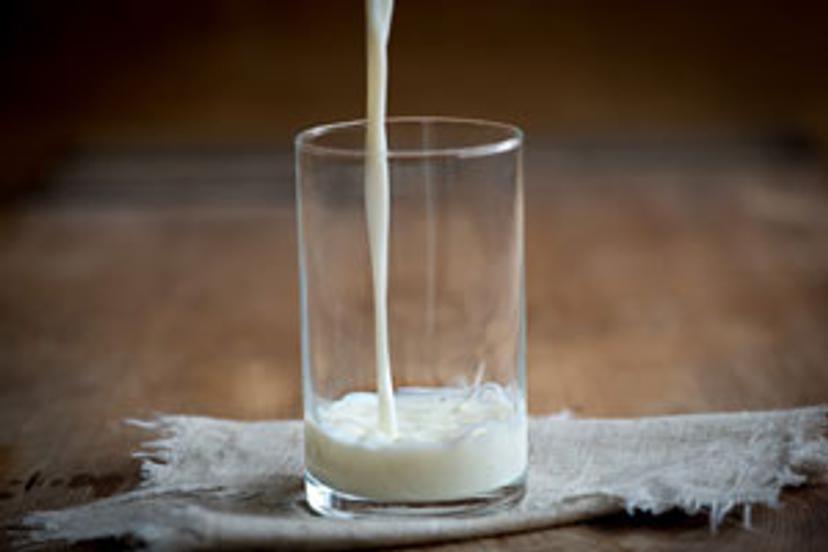 Milk being poured in to a glass 