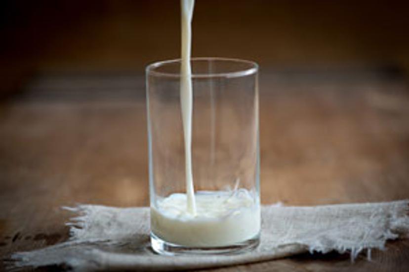Milk being poured in to a glass