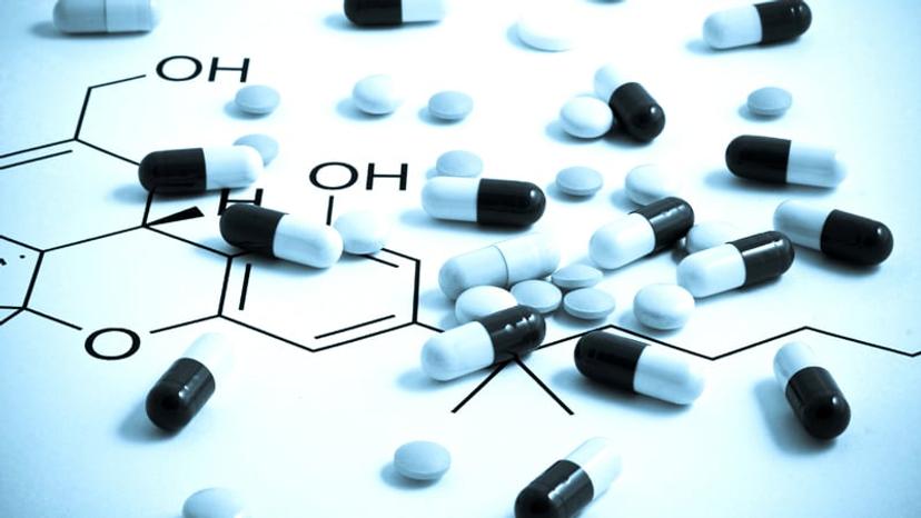 A mixture of pharmaceuticals on a diagram of a small molecule