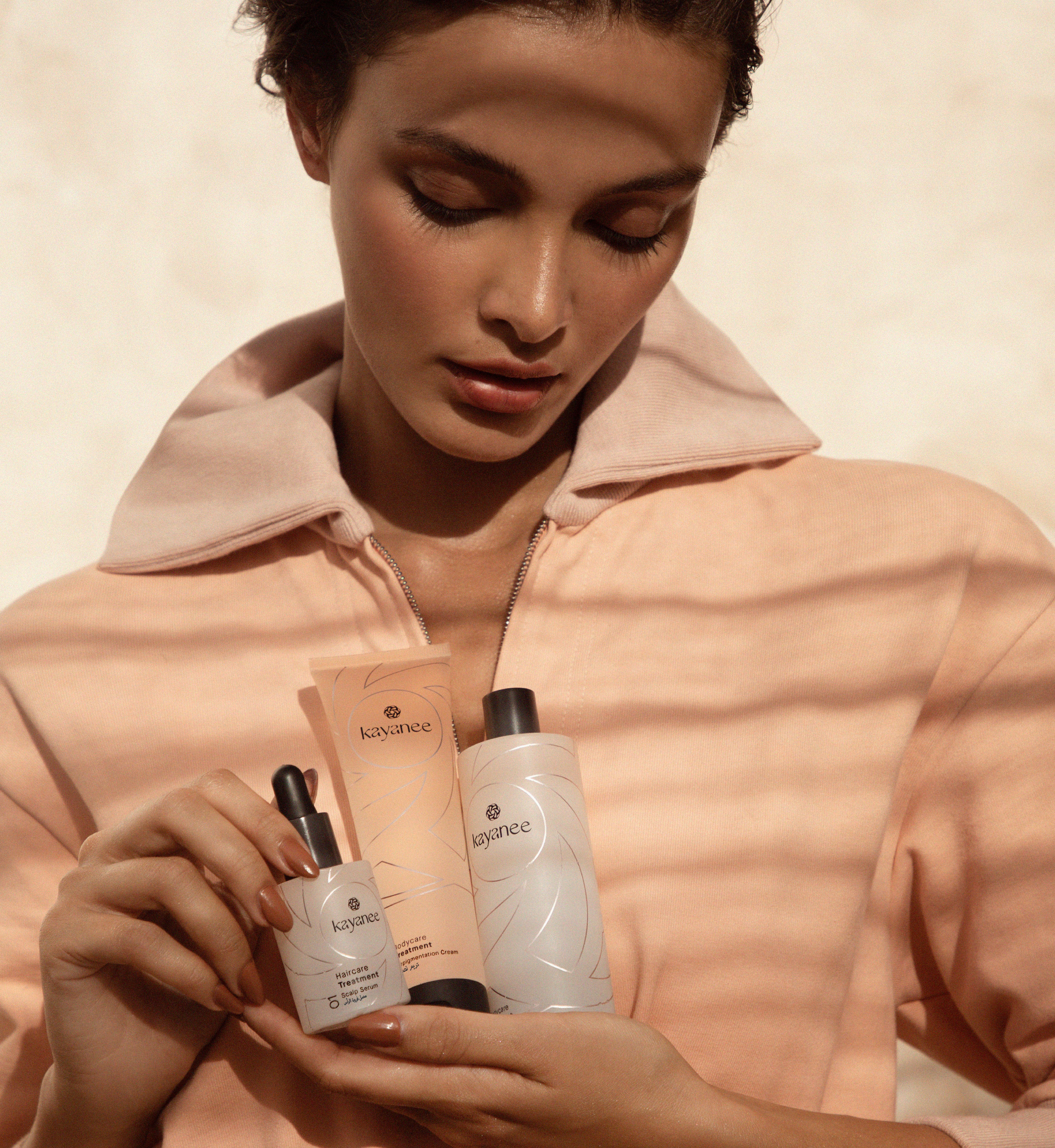 Model holding Kayanee products