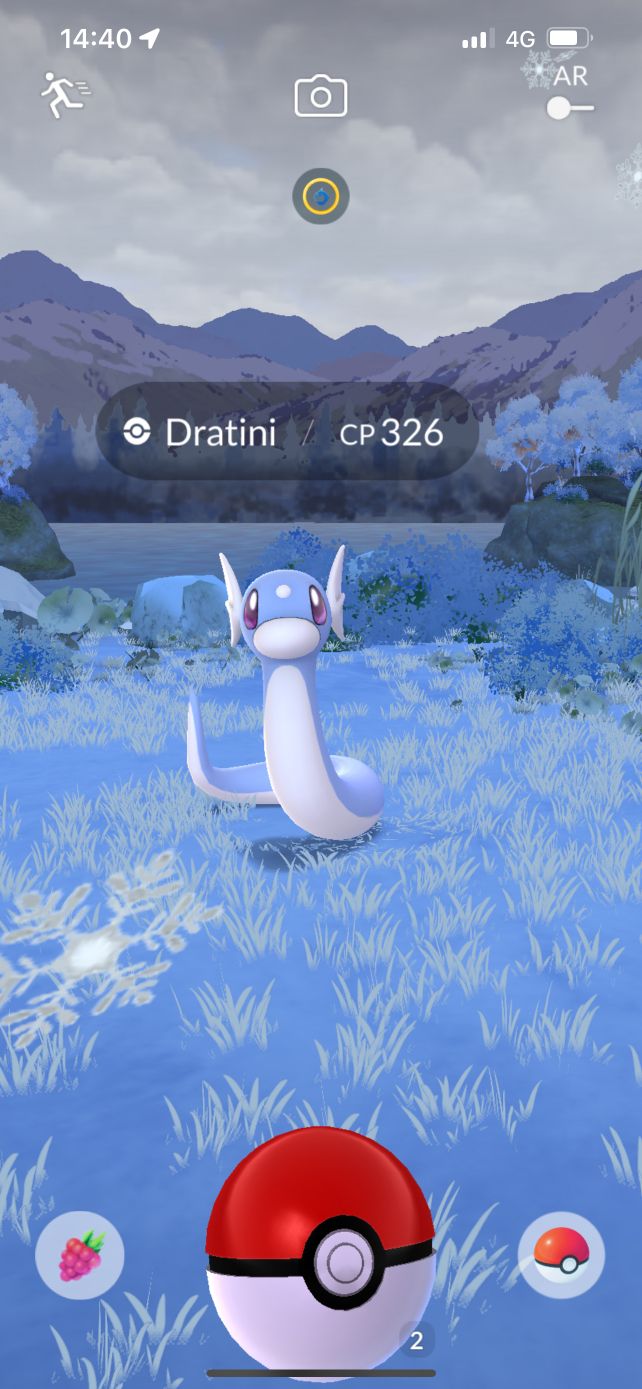 Encountering a Dratini during snowy weather in Pokémon GO