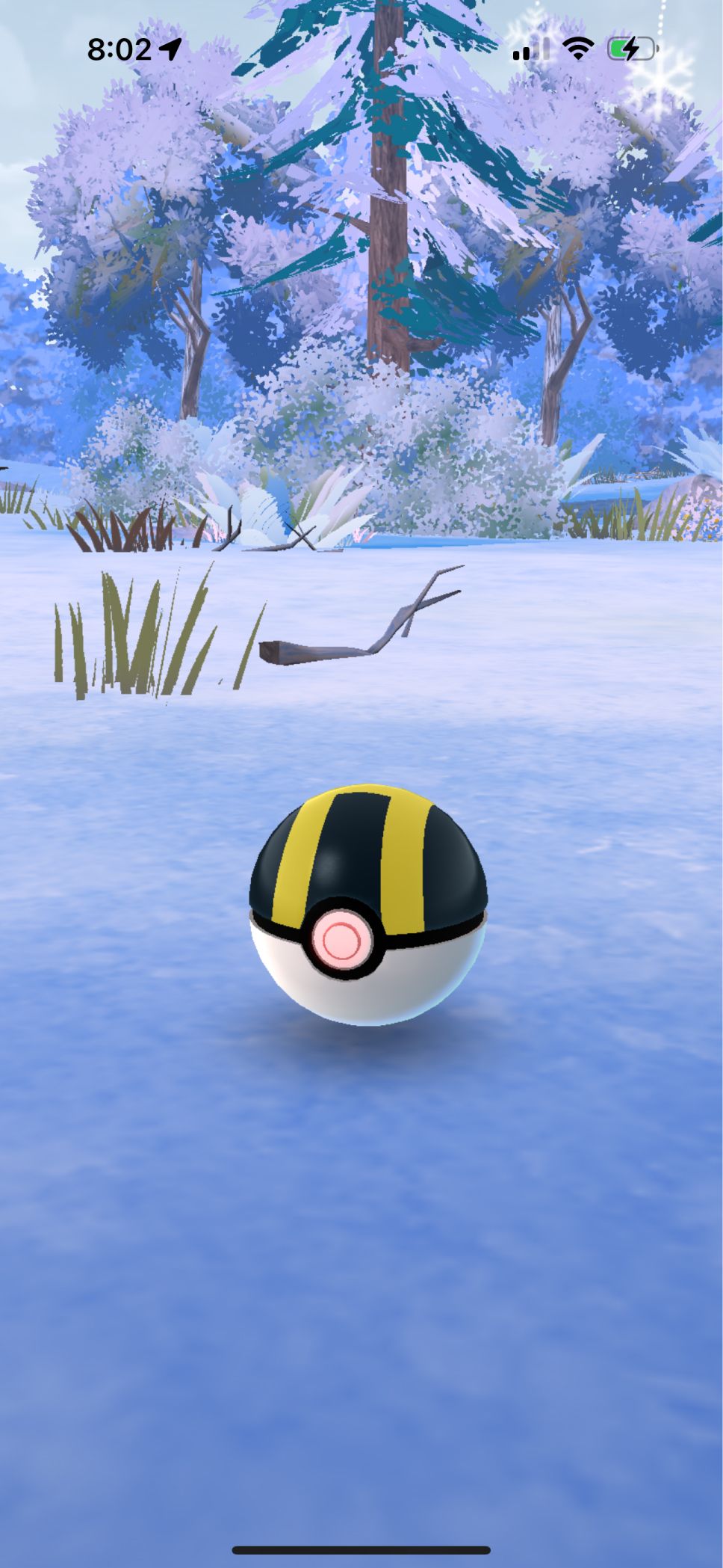 An Ultra Ball catching a Pokémon