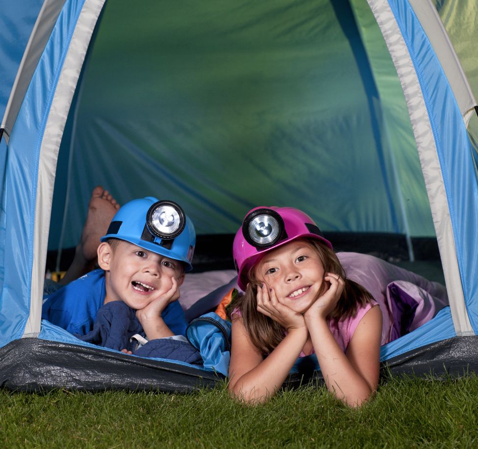 Kids camping in their backyard