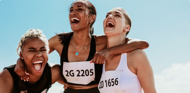 Women celebrating after a marathon