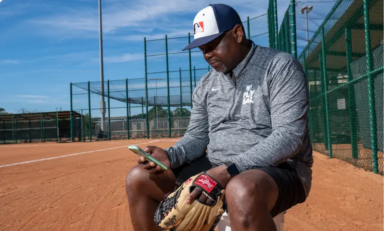 Baseball Coach on a phone