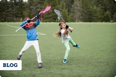 Youth Athletes playing Lacrosse