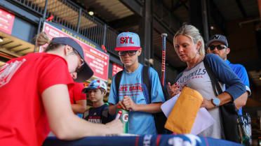 MLB champion writing an autograph