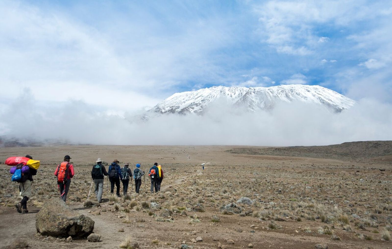 Hiking through alpine desert towards Kilimanjaro peak
