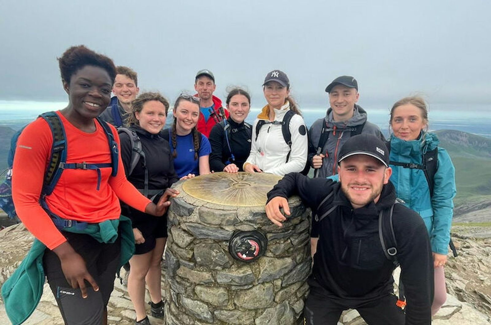 National 3 Peaks 24 hour challenging - team at summit trig point