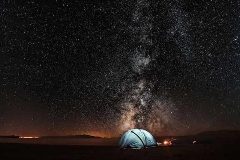wild camping under the milky way stars