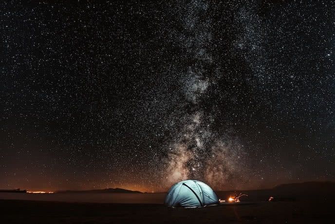 wild camping under the milky way stars