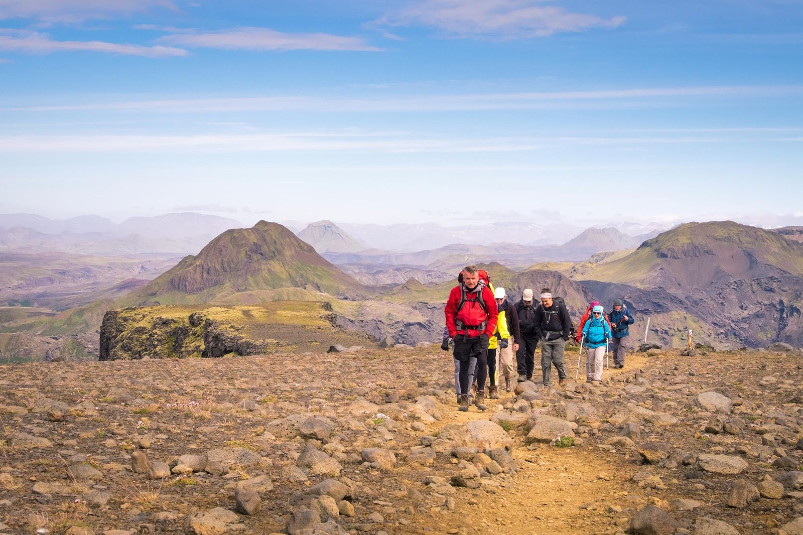 Thorsmork - hikers-on-rocky-plateau-panoramic-mountain-view-thorsmork