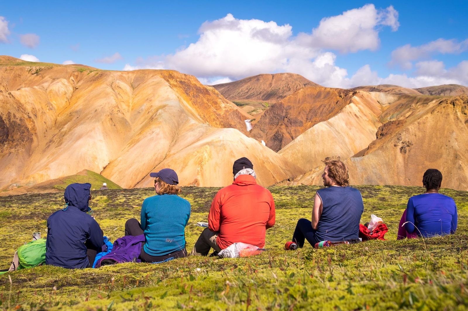 Hikers enjoying scenic mountain views in Iceland