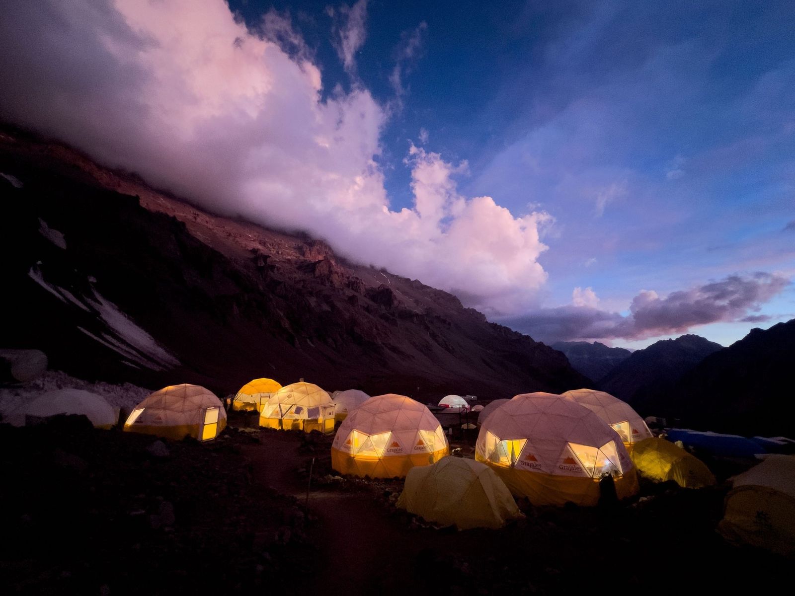 Expedition camp tents at night on Aconcagua