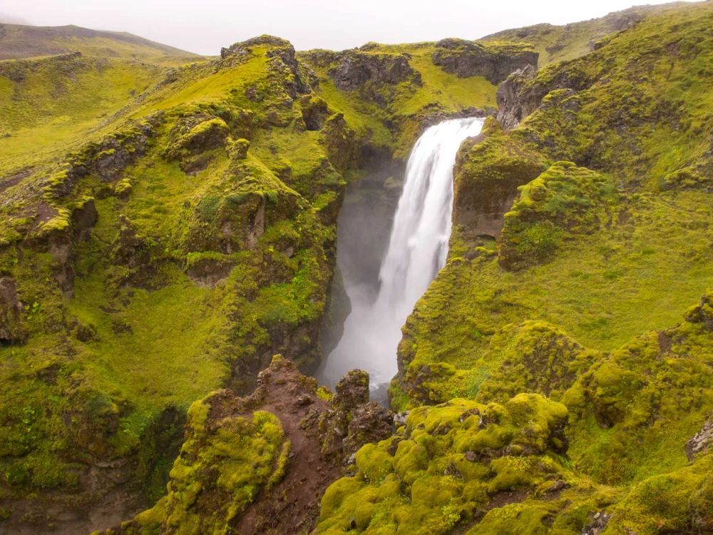 Geothermal valleys, summits and canyon waterfalls