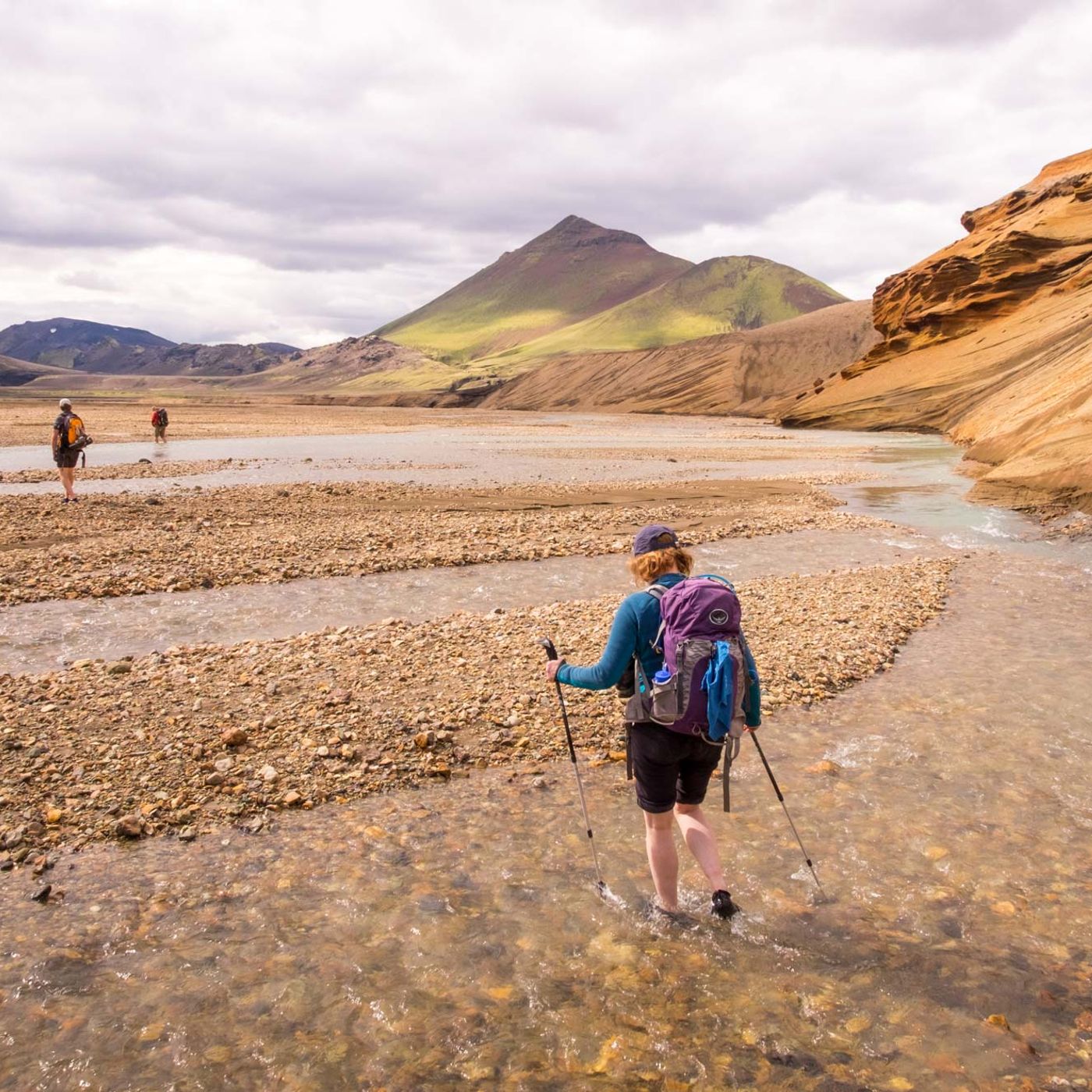 Riverside trail through volcanic landscape