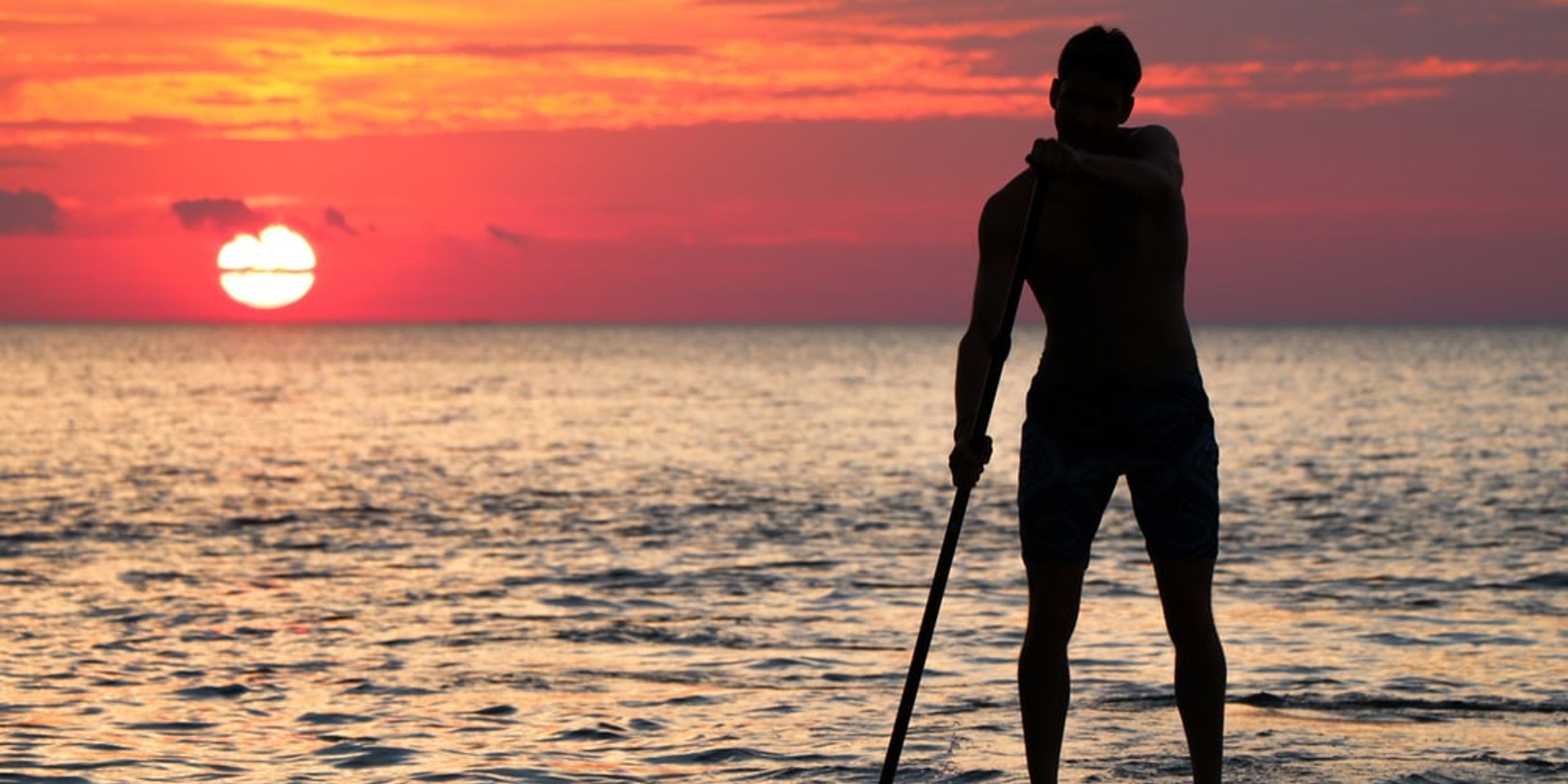 The Ultimate Beginners Guide to Stand Up Paddleboarding - with tips from Lizzie Carr